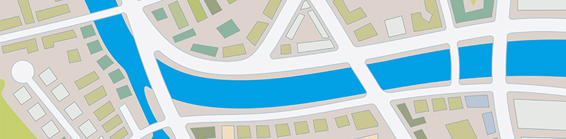 Illustrated aerial map showing city streets river and bridges